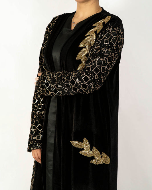 Black velvet caftan with gold embroidered sequence