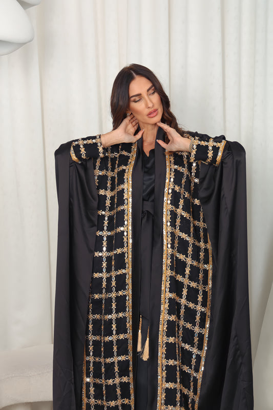 Black silk Abaya embroidered with gold stones and mirrors