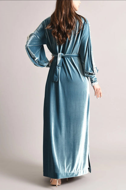 Blue velvet kaftan with white sequence and feather